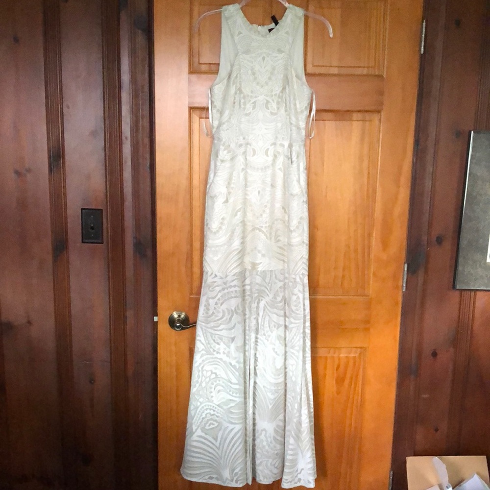 Size 0 brand new BCBG floor length dress. Never worn